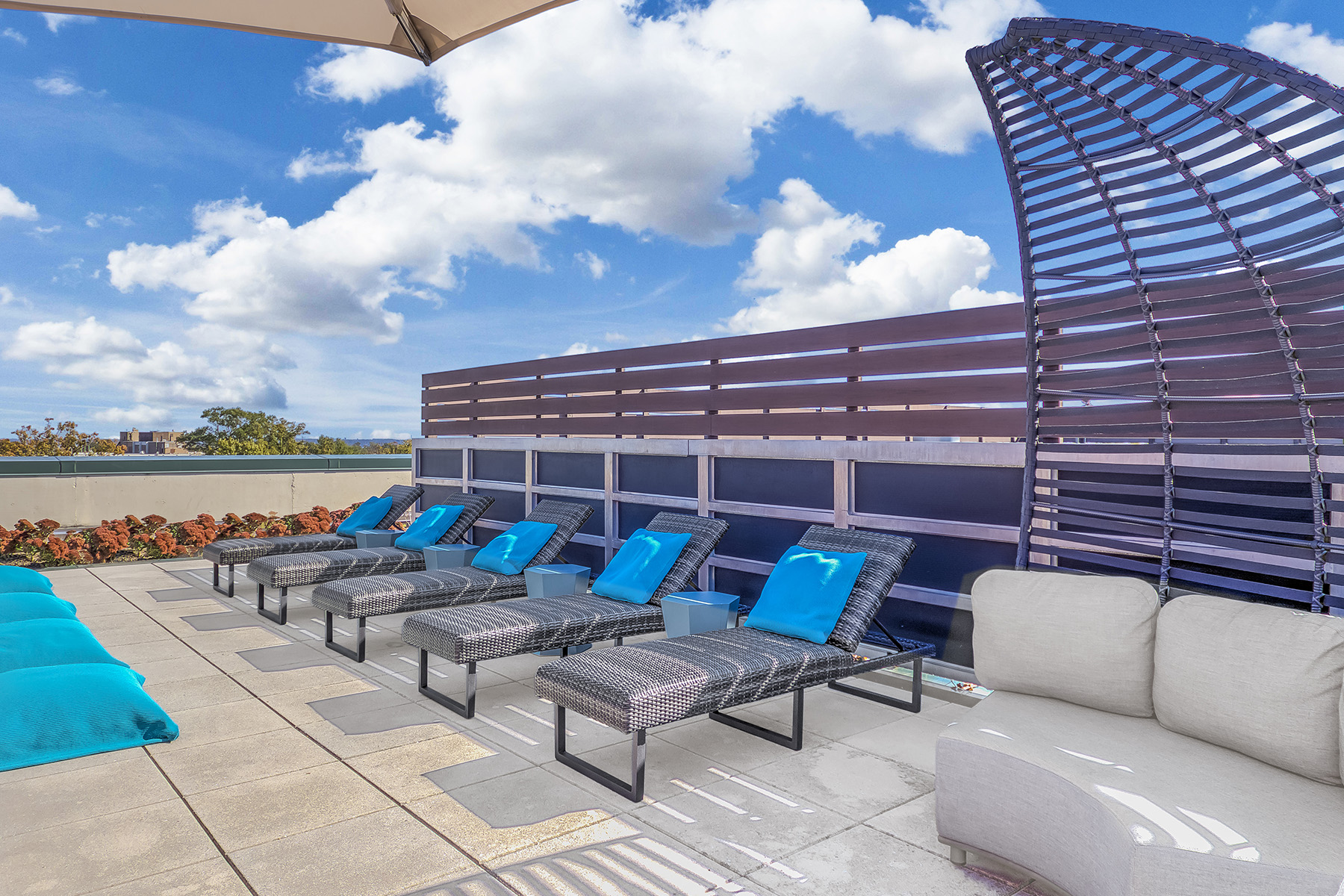 Rooftop sundeck with grilling stations and seating